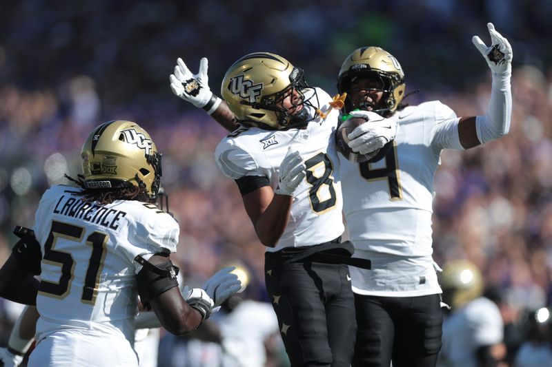 UCF Knights defensive back Demari Henderson (8) celebrates an interception during the first half of the game Sept. 27, 2025, against Kansas State Wildcats at Bill Snyder Family Stadium in Manhattan, Kansas.