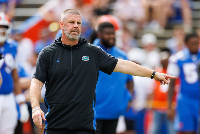 Oct 4, 2025; Gainesville, Florida, USA; Florida Gators head coach Billy Napier gestures before a game against the Texas Longhorns at Ben Hill Griffin Stadium. Mandatory Credit: Matt Pendleton-Imagn Images