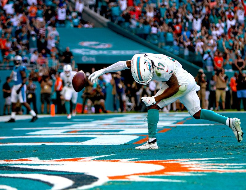 Miami Dolphins wide receiver Jaylen Waddle (17) celebrates after scoring a rushing touchdown agains the Carolina Panthers during NFL game at Hard Rock Stadium Sunday in Miami Gardens.

Carolina Panthers V Miami Dolphins 21