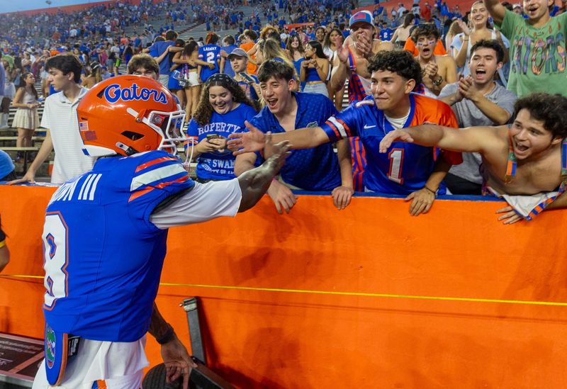 Florida wide receiver Vernell Brown III (8) greets fans after beating Texas 29-21 after the second half an NCAA football game in Gainesville, FL on Saturday, October 4, 2025. [Alan Youngblood/Gainesville Sun]