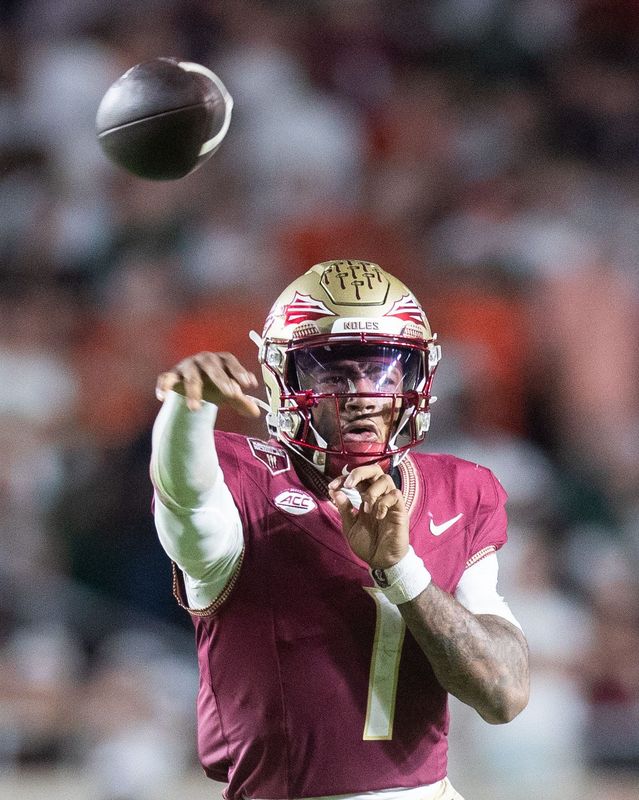 Florida State Seminoles quarterback Tommy Castellanos (1) passes the ball down the field. The Miami Hurricanes defeated the Florida State Seminoles 22-28 at Doak Campbell Stadium on Saturday, Oct. 4, 2025.