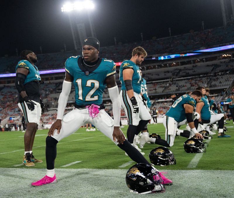 Jacksonville Jaguars wide receiver Travis Hunter (12) stretches before an Monday Night NFL football game at EverBank Stadium, Monday, Oct. 6, 2025, in Jacksonville, Fla. [Doug EngleFlorida Times-Union]