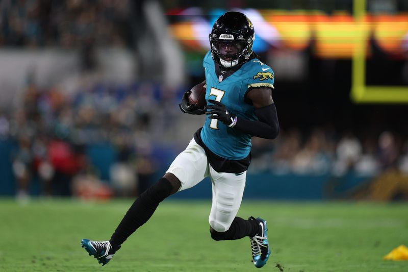 Oct 6, 2025; Jacksonville, Florida, USA; Jacksonville Jaguars wide receiver Brian Thomas Jr. (7) runs during the first half against the Kansas City Chiefs at EverBank Stadium. Mandatory Credit: Nathan Ray Seebeck-Imagn Images