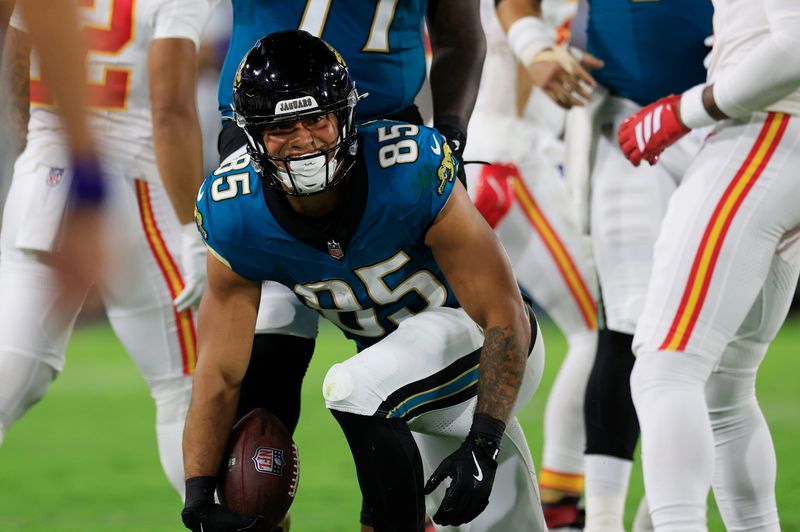 Jacksonville Jaguars tight end Brenton Strange (85) gets to his feet during the first quarter of an NFL football matchup at EverBank Stadium, Monday, Oct. 6, 2025, in Jacksonville, Fla. The Jacksonville Jaguars edged the Kansas City Chiefs 31-28. [Corey Perrine/Florida Times-Union]