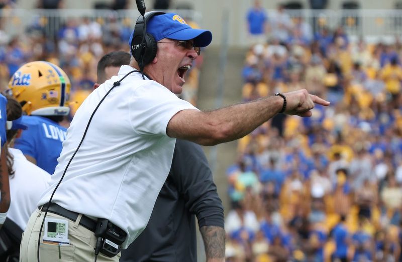 Sep 27, 2025; Pittsburgh, Pennsylvania, USA; Pittsburgh Panthers head coach Pat Narduzzi reacts on the field against the Louisville Cardinals during the second quarter at Acrisure Stadium. Mandatory Credit: Charles LeClaire-Imagn Images