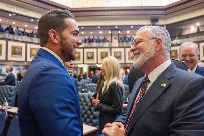 Speaker of the House Daniel Perez, left, greets Senate President Ben Albritton on Thursday, Oct. 9, 2025.