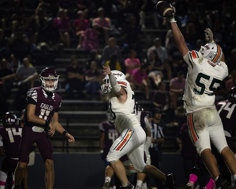 Mosley's Cole Archambeau (55) makes a play against Niceville at Eagle Stadium in Niceville, Fla., Oct. 9, 2025. (Tyler Orsburn/News Herald)