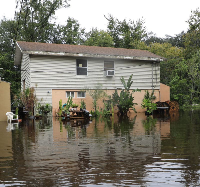 Flooding along Canal Road and Cheeta Drive in Edgewater on Friday, Oct. 10, 2025.