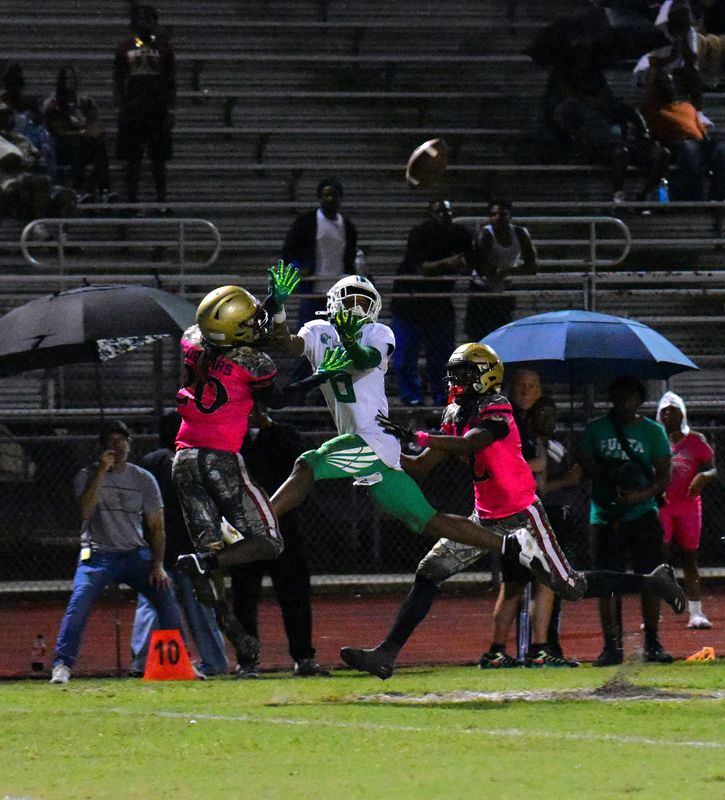 Atlantic's James Jones goes airborne for the tough catch during a district rivalry game against Coconut Creek on Oct. 10, 2025.
