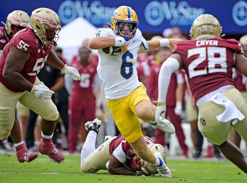 Pittsburgh Panthers quarterback Mason Heintschel (6) runs the ball in the first quarter Oct. 11, 2025 against the Florida State Seminoles at Doak S. Campbell Stadium in Tallahassee, Florida. Mandatory Credit: Melina Myers-Imagn Images