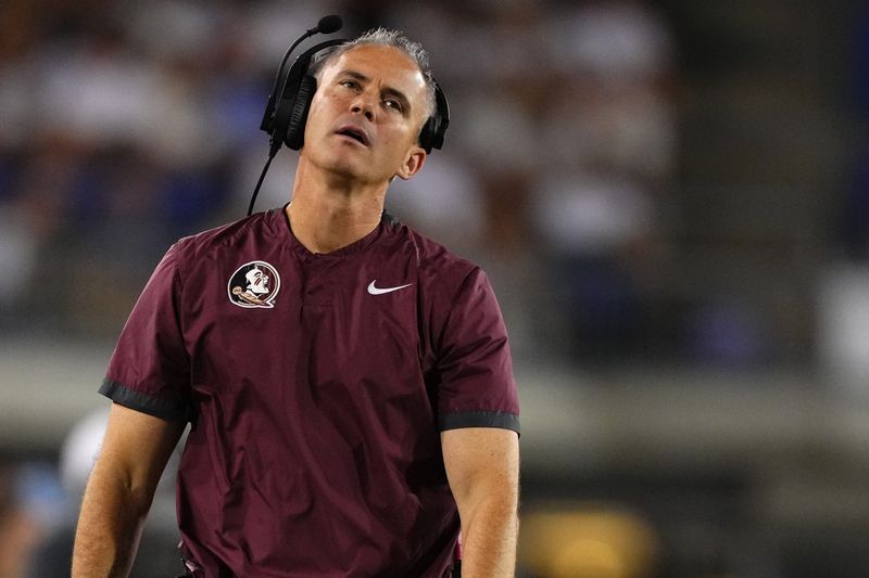 DALLAS, TEXAS - SEPTEMBER 28: Head coach Mike Norvell of the Florida State Seminoles reacts as he walks on the sideline during the second half against the Southern Methodist Mustangs at Gerald J. Ford Stadium on September 28, 2024 in Dallas, Texas. (Photo by Sam Hodde/Getty Images)