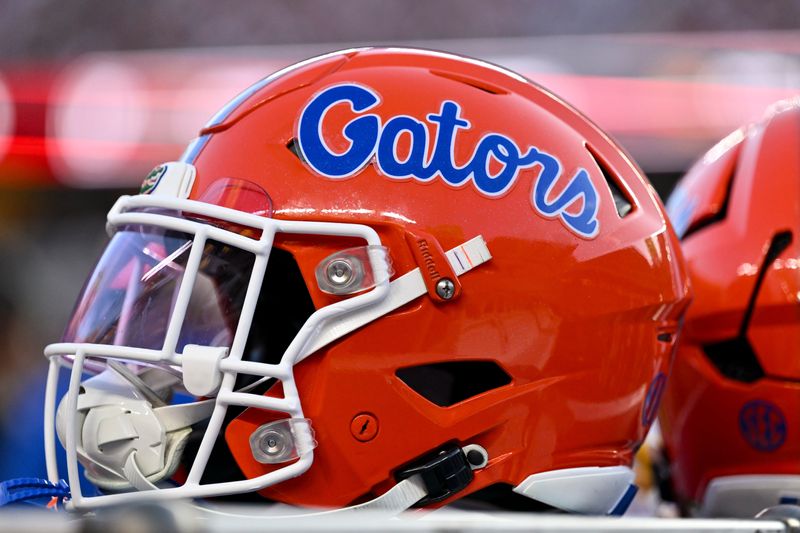 Oct 11, 2025; College Station, Texas, USA; A detail view of a Florida Gators helmet on the sideline during the first half against the Texas A&M Aggies at Kyle Field. Mandatory Credit: Maria Lysaker-Imagn Images