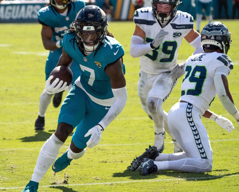 Jacksonville Jaguars wide receiver Brian Thomas Jr. (7) catches a pass and runs in for a touchdown but was called back during the third quarter in an NFL football game at EverBank Stadium, Sunday, Oct. 12, 2025, in Jacksonville, Fla. [Doug Engle/Florida Times-Union]