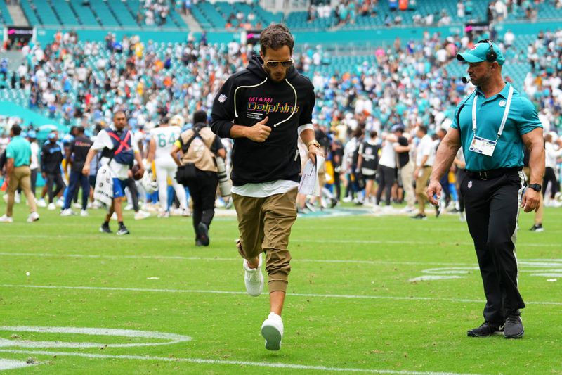Oct 12, 2025; Miami Gardens, Florida, USA; Miami Dolphins head coach Mike McDaniel leaves the field at the end of a game against the Los Angeles Chargers at Hard Rock Stadium. Mandatory Credit: Rich Storry-Imagn Images