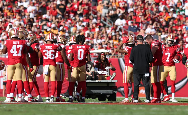 Oct 12, 2025; Tampa, Florida, USA; San Francisco 49ers middle linebacker Fred Warner (54) is carted off the field during the first quarter against the Tampa Bay Buccaneers at Raymond James Stadium. Mandatory Credit: Nathan Ray Seebeck-Imagn Images