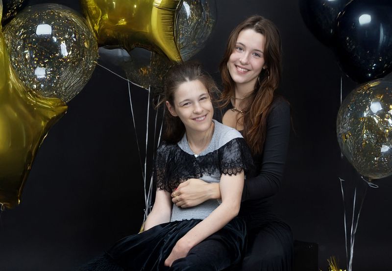 Sophia Sharypov, right, was inspired to found the Bridge Abilities program because of the struggles of her twin sister, Maria, who was born with cerebral palsy.