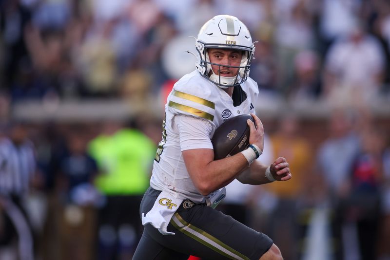 Georgia Tech Yellow Jackets quarterback Haynes King (10) runs the ball for a touchdown against the Virginia Tech Hokies in the fourth quarter at Bobby Dodd Stadium at Hyundai Field in Atlanta, Georgia.