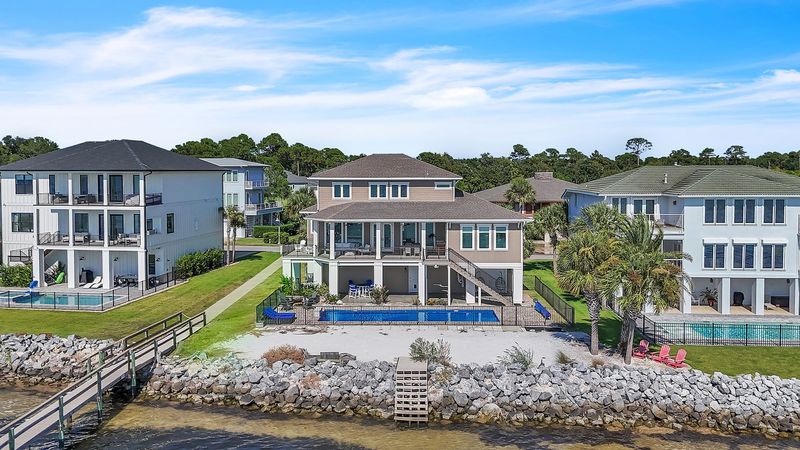 The home is oriented on it's own private white sand beach.