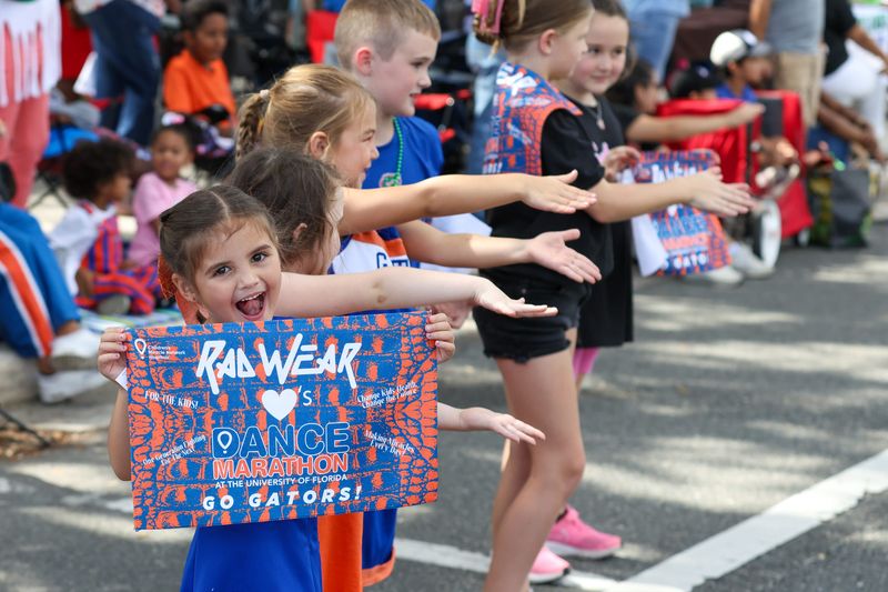 Little cheerleaders cheered on the parade during the 2025 University of Florida Homecoming Parade on Oct. 17, 2025, in Gainesville. Hundreds of fans lined University Avenue for the annual spectacle. Everybody from Albert and Alberta to tiny twirlers entertained the crowd.