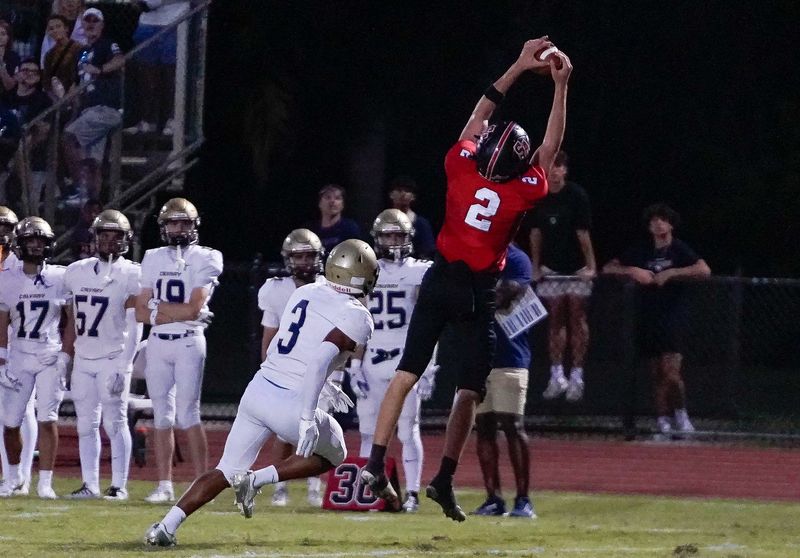 St. Andrews tight end Quinn Connors (2) catches a pass in the second quarter against Calvary Christian Academy on Oct. 17, 2025, in Boca Raton, FL.