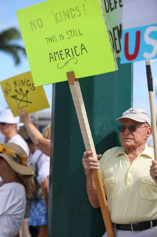 World War II veteran Patrick Callihan, 97, of Hobe Sound, participates in the 'No Kings' protest at the Kanner Highway and U.S. 1 intersection, Oct. 18, 2025, in Stuart. This was one of six protests on the Treasure Coast, and one of thousands nationwide.
