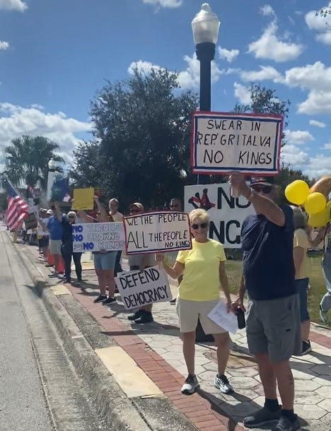 Protesters line South Florida Avenue in Lakeland during the second No Kings rally at Freedom Park on Oct. 18, 2025.