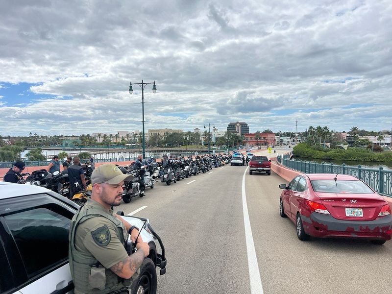 The International Speedway Boulevard bridge was partially blocked off while a group of 25-30 Pagan Motorcycle Club members were stopped for "multiple traffic violations," according to the Volusia Sheriff's Office.