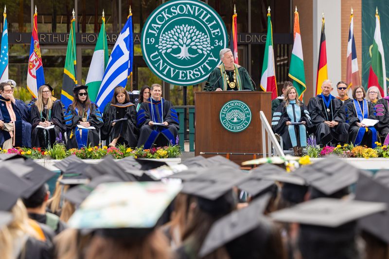 Jacksonville University President Tim Cost speaks at the May commencement ceremony at JU's Brooks Rehabilitation College of Healthcare Sciences.