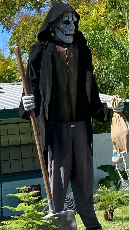 A towering skeleton stands guard in the front yard of a home on Marion Court in DeLand.