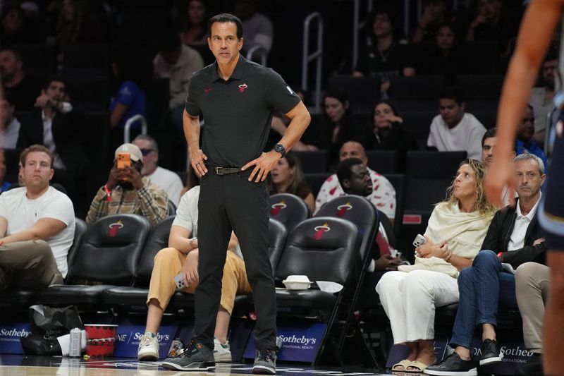 Oct 17, 2025; Miami, Florida, USA; Miami Heat head coach Erik Spoelstra looks on during the second half against the Memphis Grizzlies at Kaseya Center. Mandatory Credit: Jim Rassol-Imagn Images
