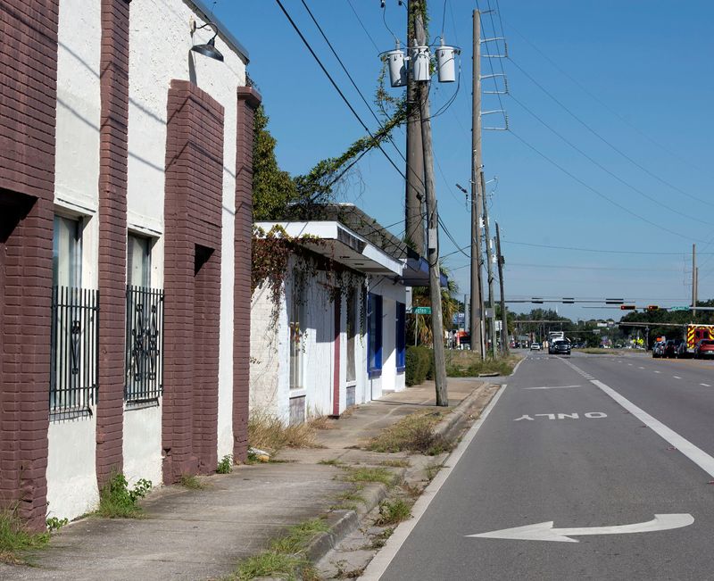 Escambia County is developing a plan to tackle the blight, overgrowth, and vacant buildings on South Navy Boulevard to reimagine the county's gateway to Naval Air Station Pensacola.
