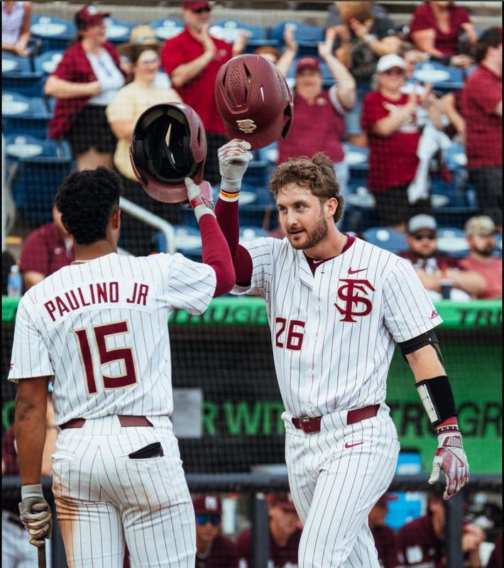 Kelvyn Paulino Jr. and Eli Putnam celebrate during an exhibition game against Mississippi State on Oct. 18.