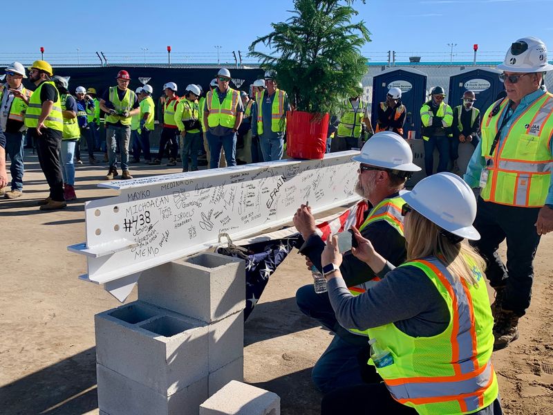 Workers who have been part of the construction of the new concourse being built at Jacksonville International Airport could sign their names to the last piece of steel for the structure during a topping off ceremony on Oct. 24, 2025.