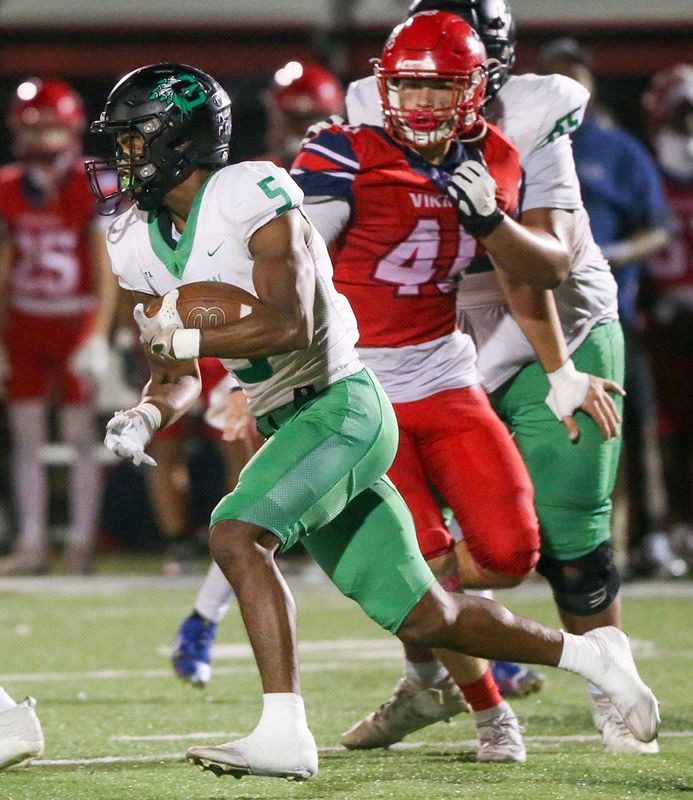 Indians runner Dante Whidbee carries the ball during the Choctaw and Fort Walton Beach crosstown rivalry football game.