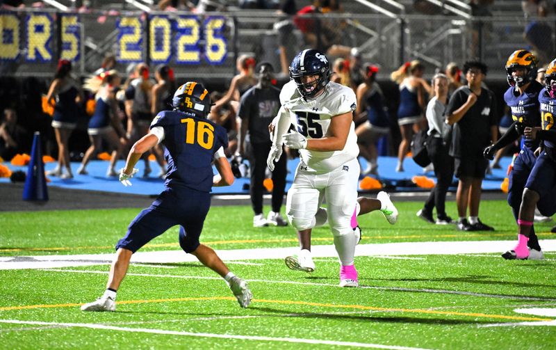 Spanish River's Matthew Raiman focuses on his opponent to clear the path during a 28-20 district-deciding victory against Boca Raton on Oct. 24, 2025.