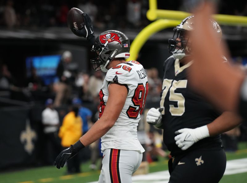 Oct 26, 2025; New Orleans, Louisiana, USA; Tampa Bay Buccaneers linebacker Anthony Nelson (98) reacts after a touchdown during the first quarter against the New Orleans Saints at Caesars Superdome. Mandatory Credit: Matthew Hinton-Imagn Images