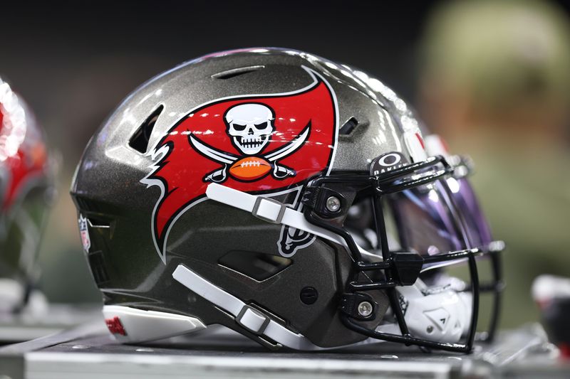 Oct 26, 2025; New Orleans, Louisiana, USA; A Tampa Bay Buccaneers helmet is seen on the sidelines prior to a game against the New Orleans Saints at Caesars Superdome. Mandatory Credit: Stephen Lew-Imagn Images