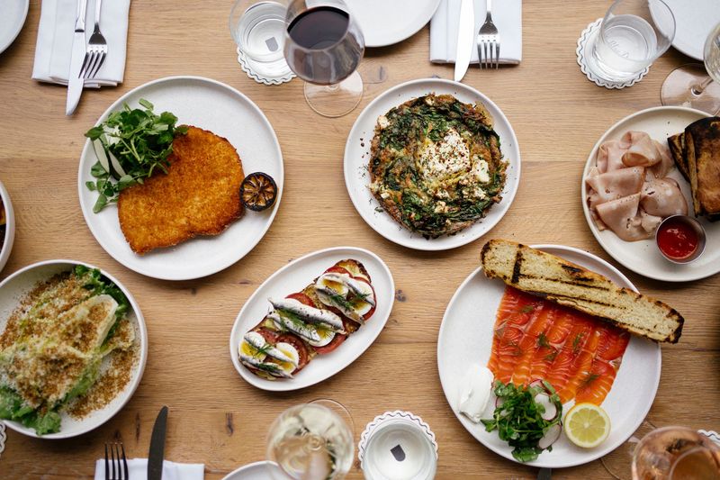The Blue Door starts lunch service on Oct. 31 every Friday through Sunday. Dishes include anchovy and egg toast; focaccia and mortadella; chicken Milanese with zucchini salad; beef and lamb kababs; baked feta and spinach frittata.