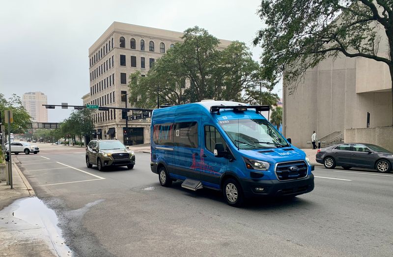 A NAVI transit shuttle heads down Bay Street in Jacksonville, Fla. on Oct. 28, 2025. The Bay Street loop is the first part of the Ultimate Urban Circulator the Jacksonville Transportation Authority plans to build through downtown with connections to surrounding neighborhoods using autonomous transit shuttles.