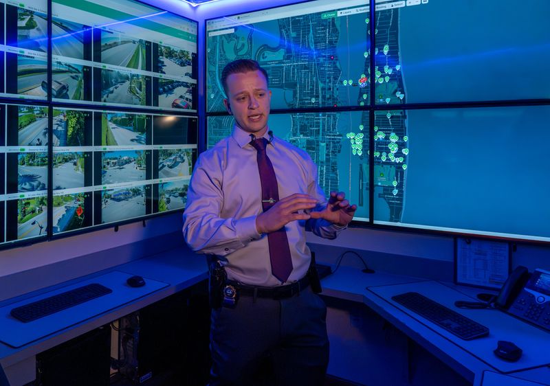 Palm Beach Police Detective Daniel Meblin discusses the department's Real Time Crime Center during a news conference in Palm Beach on Oct. 28. Residents can now sign up for the Palm Beach Community Connect Program to register their security cameras to provide access to investigators.