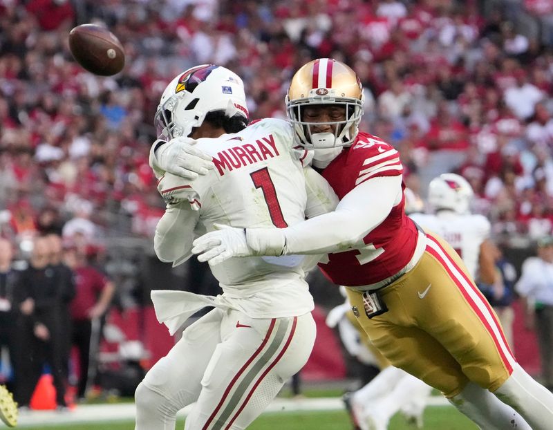 Dec 17, 2023; Glendale, Ariz, United States; Arizona Cardinals quarterback Kyler Murray (1) delivers a pass while hit by San Francisco 49ers defensive end Clelin Ferrell (94) during the third quarter at State Farm Stadium. Mandatory Credit: Michael Chow-Arizona Republic