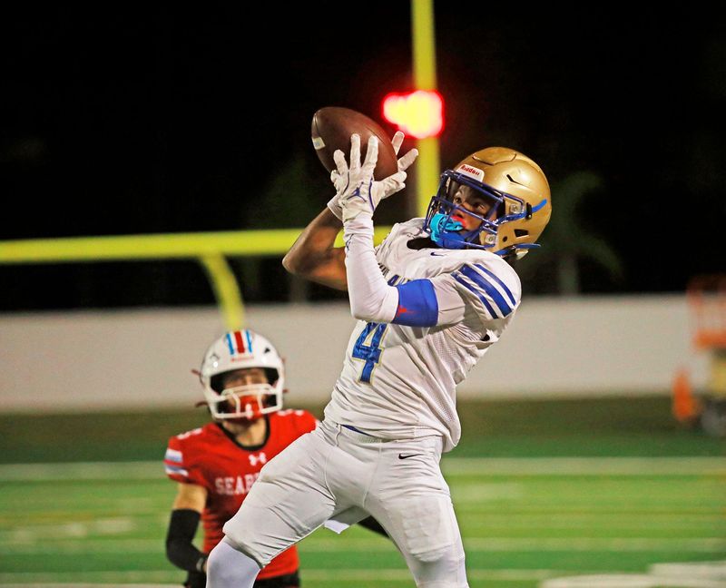 Mainland’s Christian Cooper (4) makes a catch during the game against Seabreeze High School at Daytona Stadium, Friday, Oct. 31, 2025.