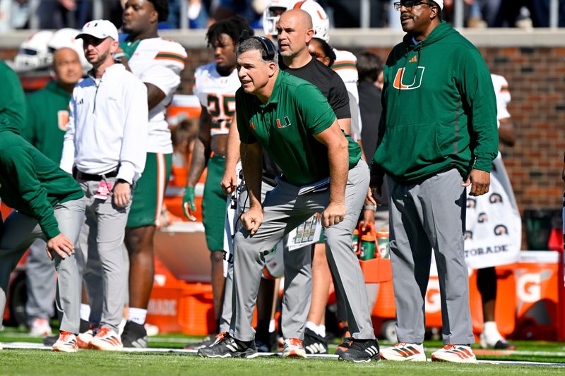 Nov 1, 2025; Dallas, Texas, USA; Miami Hurricanes head coach Mario Cristobal looks on from the sidelines during the second half against the SMU Mustangs at Gerald J. Ford Stadium. Mandatory Credit: Jerome Miron-Imagn Images