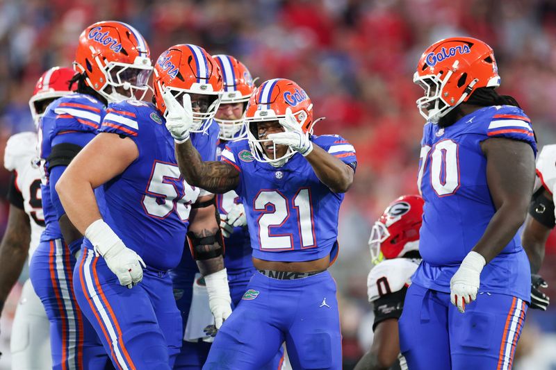 Nov 1, 2025; Jacksonville, Florida, USA; Florida Gators running back KD Daniels (21) celebrates a play in the second half against the Georgia Bulldogs at EverBank Stadium. Mandatory Credit: Matt Pendleton-Imagn Images