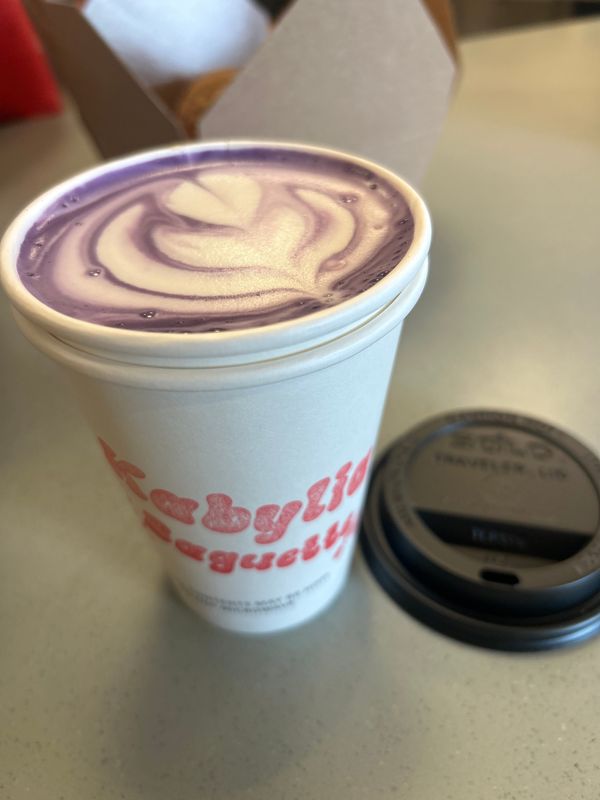 An ube latte steamer has a purple hue at Kabylia Baguette in Akron.