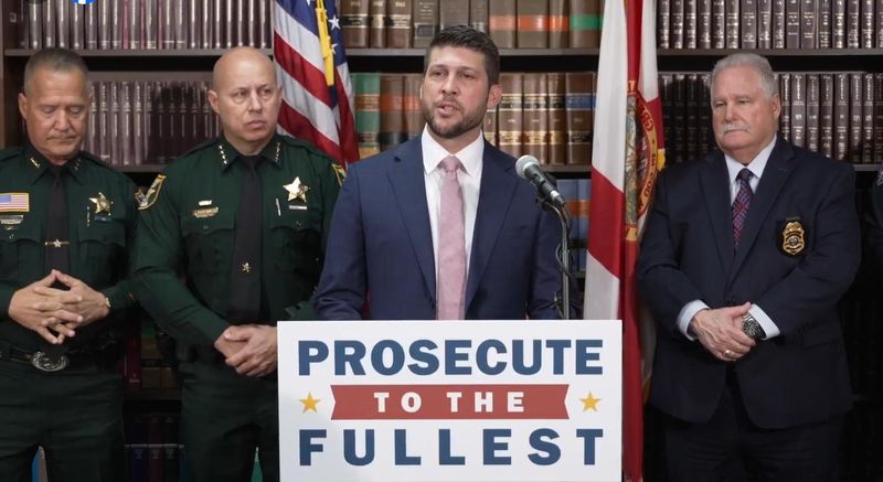 Florida Attorney General James Uthmeier (center) addresses reporters on Nov. 4, 2025.
