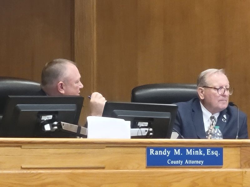 Polk County Attorney Randy Mink advises Commission on school tax referendum.