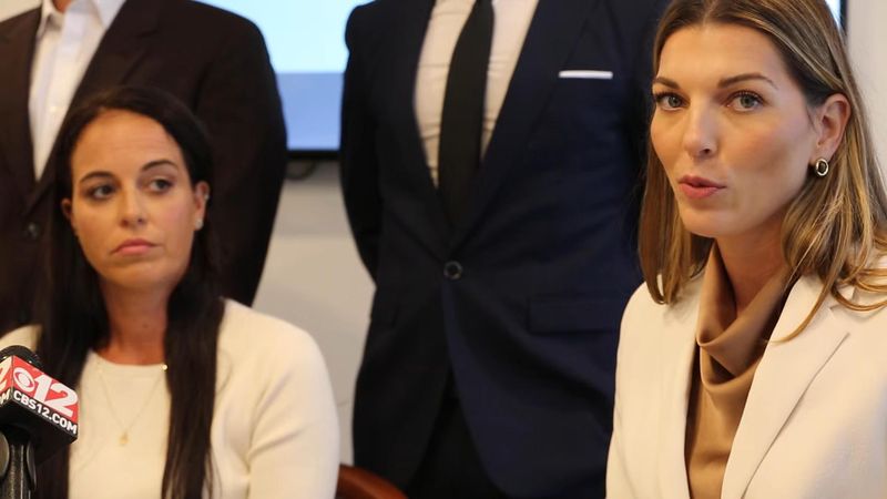 In this October 2025 photo, Defense attorney Mac Kenzie Sacks, of South Florida Justice, appears beside her client Walquiria Cassini during a press conference after charges against Cassini were dismissed.