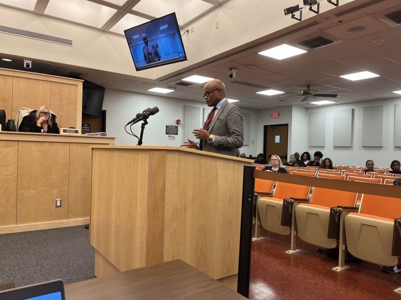 The city of Daytona Beach has its internal auditor putting together a report on employee purchase card use. Pictured is Internal Auditor Abinet Belachew speaking to Daytona Beach city commissioners during a discussion on employee p-cards.