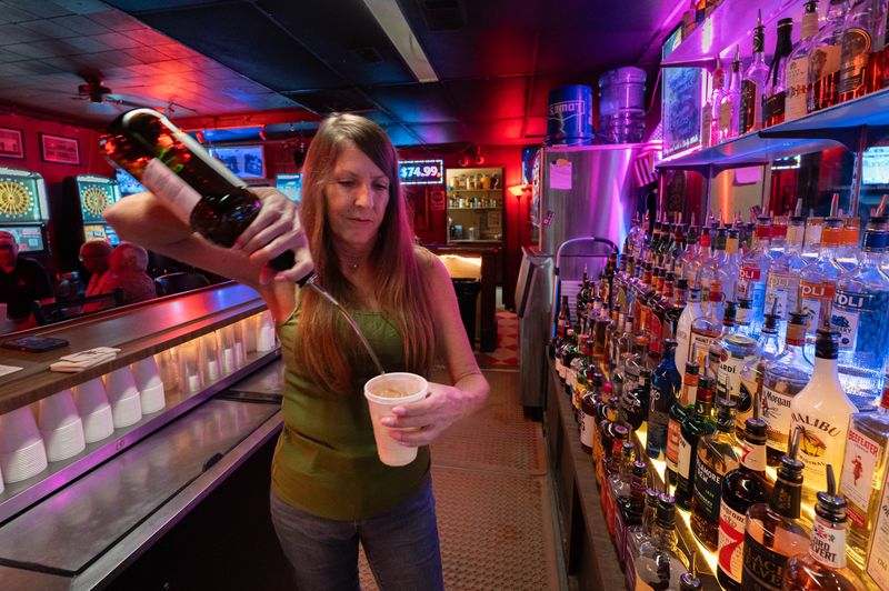 Bartender Tina Baker Bailey pours a drink at the Azalea Cocktail Lounge in Pensacola on Nov. 6, 2025.